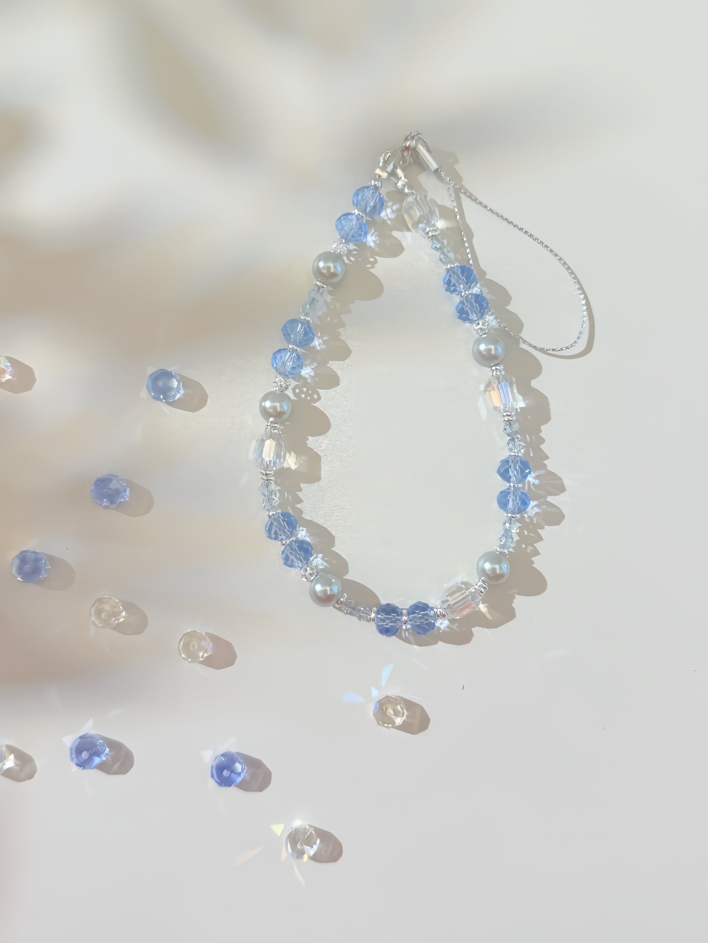 Ocean Breeze Crystal Phone Charm: Blue Beaded Phone Strap with Pearls